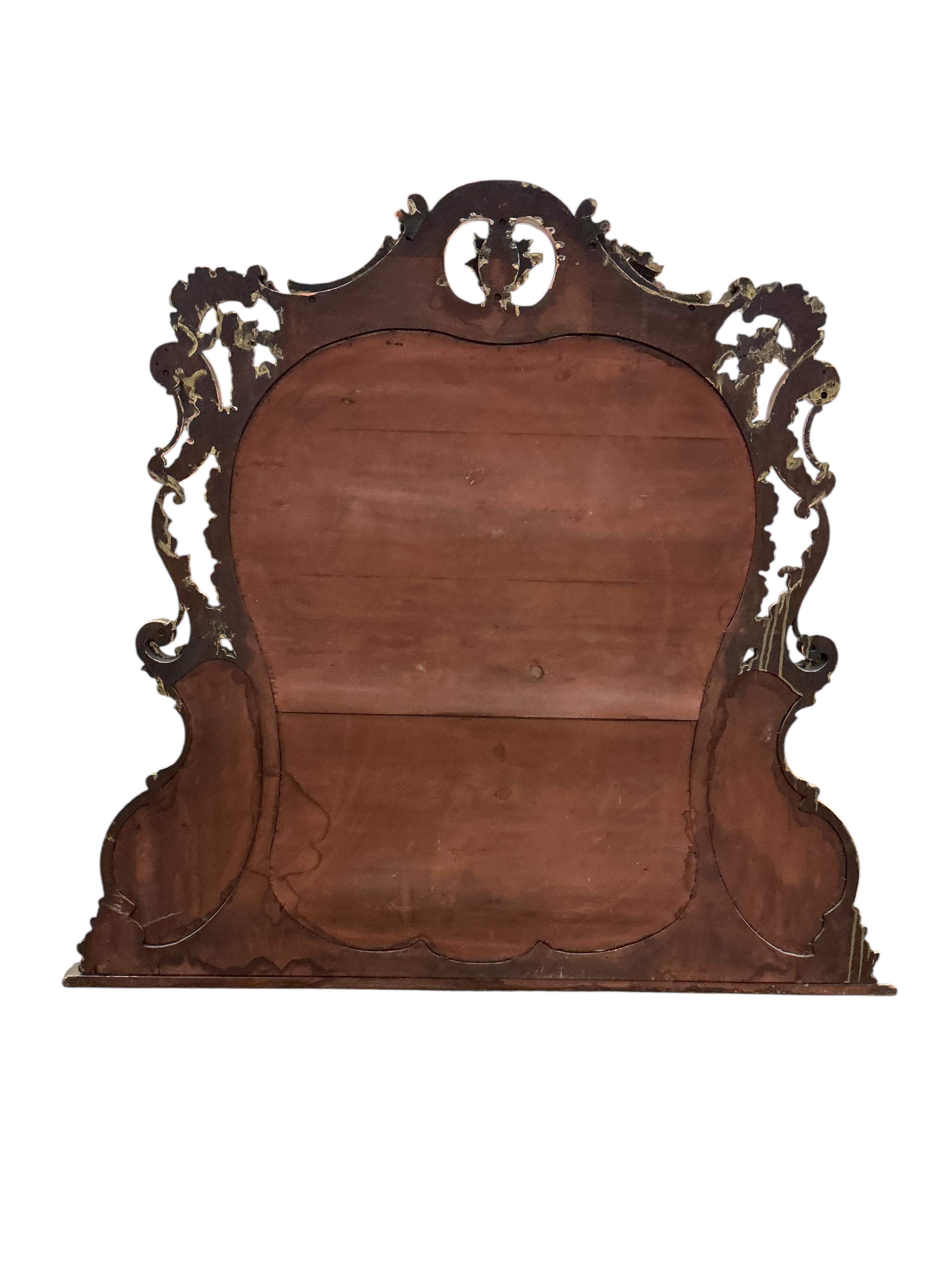 A Victorian giltwood and composition overmantel mirror with bevelled plates, later gilt painted, width 142cm, height 130cm